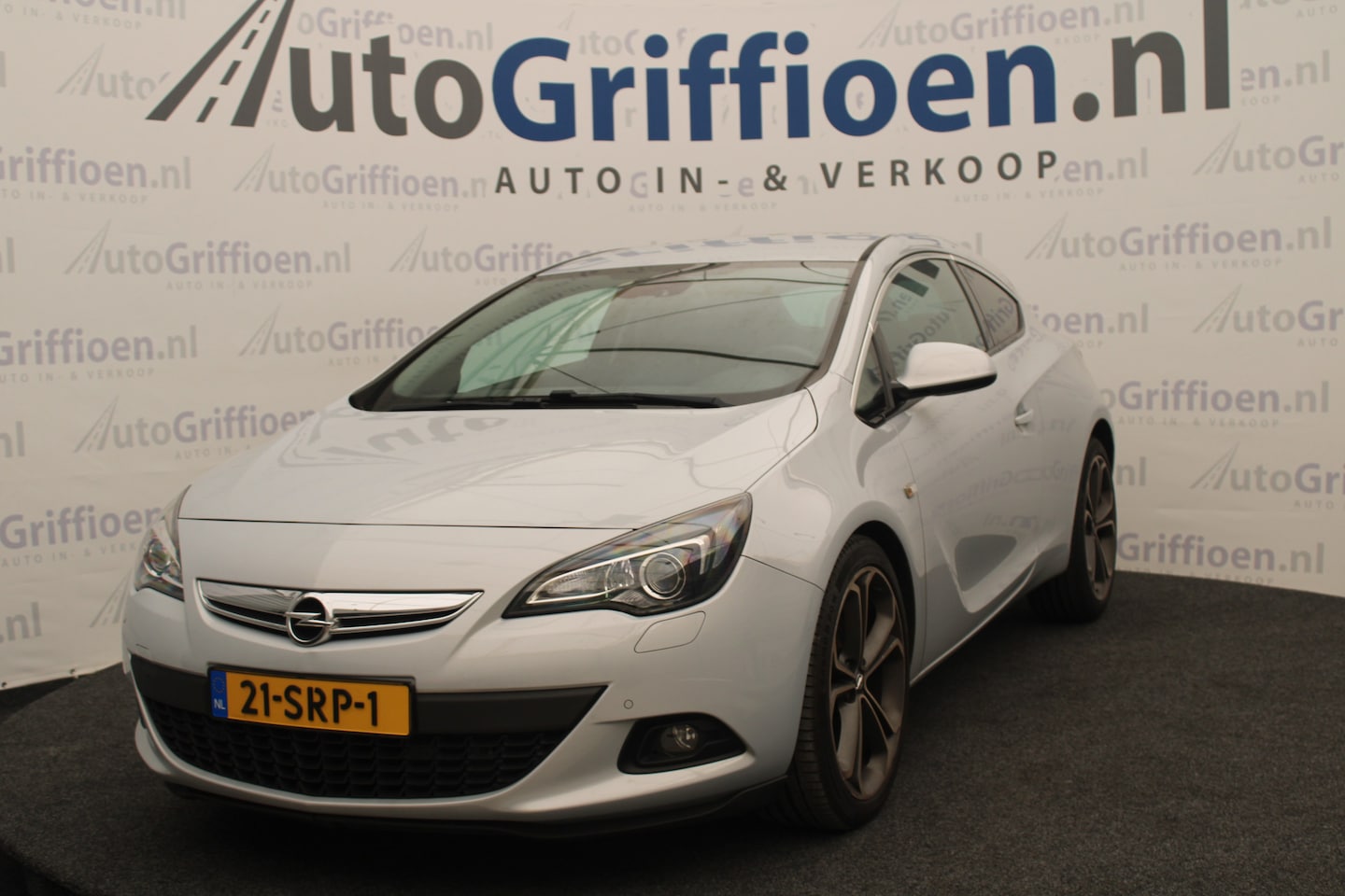 Opel Astra GTC - 1.4 Turbo Sport keurige coupé met leer - AutoWereld.nl