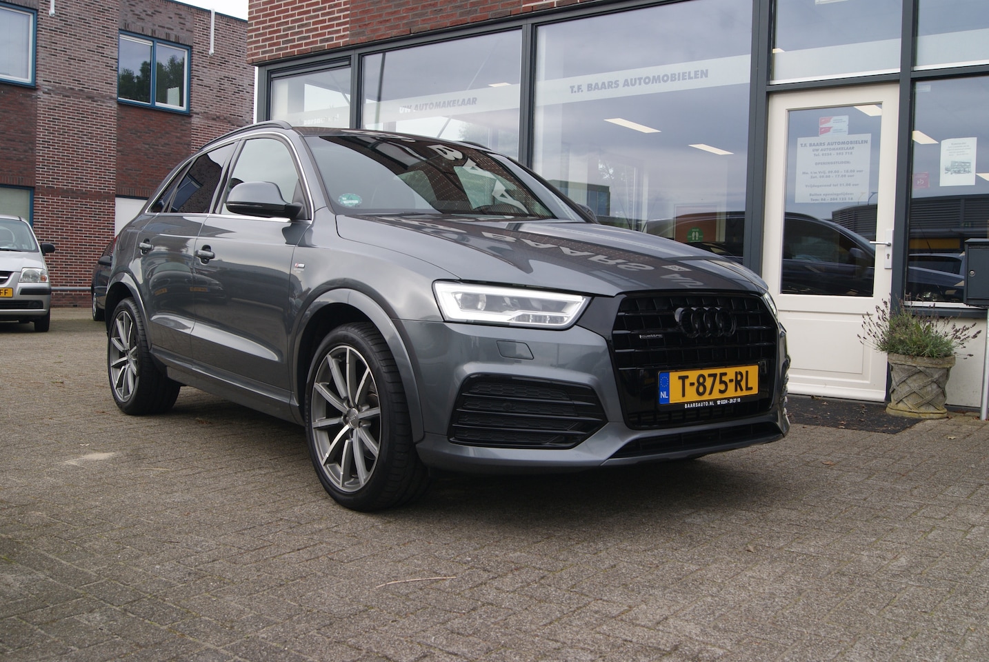 Audi Q3 - 2.0 TFSI 220PK Quattro S tronic Design - AutoWereld.nl