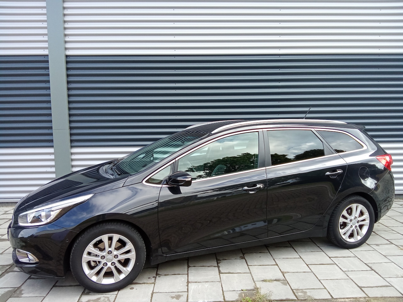 Kia Cee'd Sportswagon - 1.6 GDI Super Pack Navigatie Climatronic Trekhaak Camera NAP - AutoWereld.nl