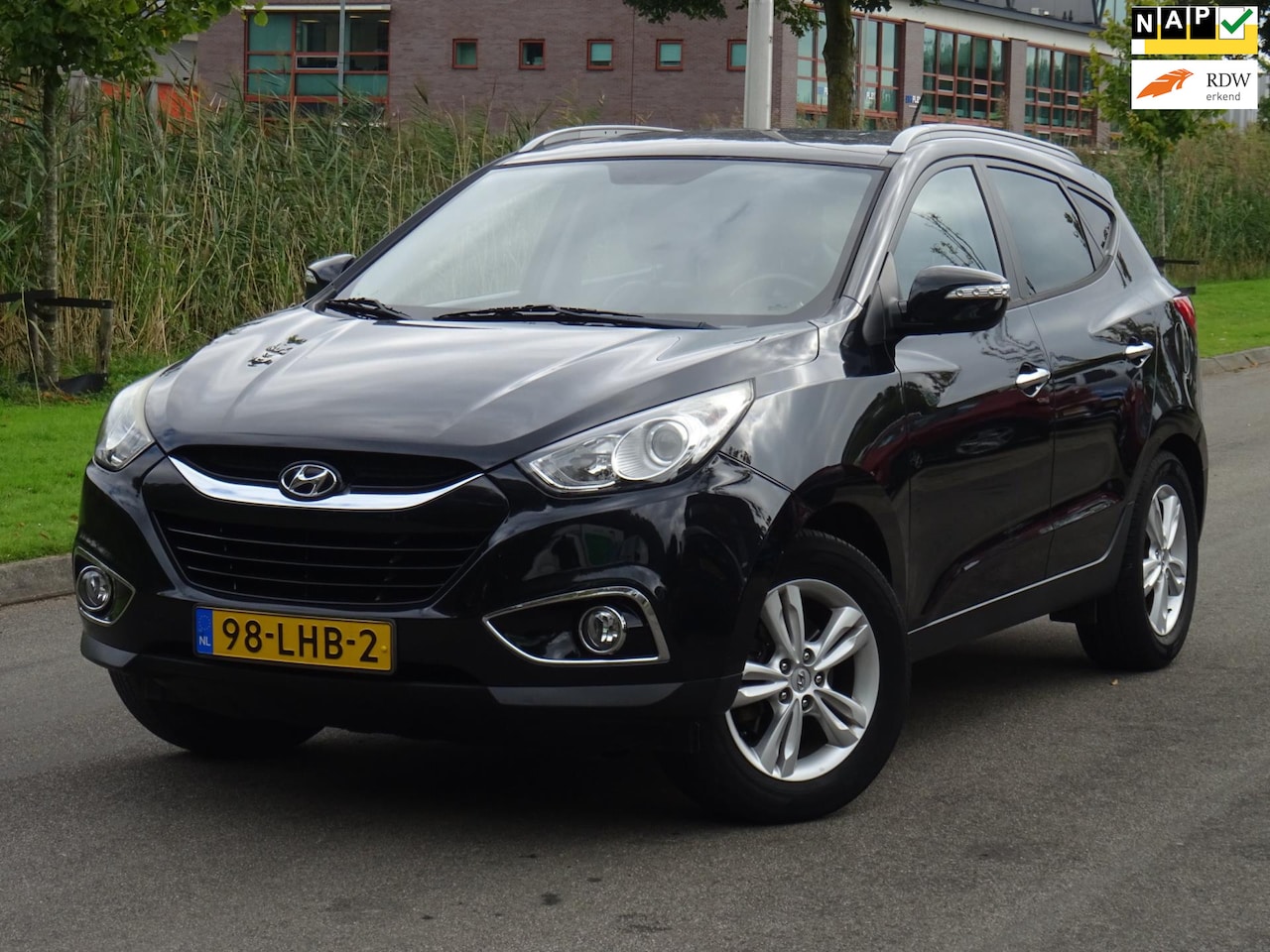 Hyundai ix35 - 2.0i Style NAP/LEER/NAVI/CAMERA/APK 08-2025 - AutoWereld.nl