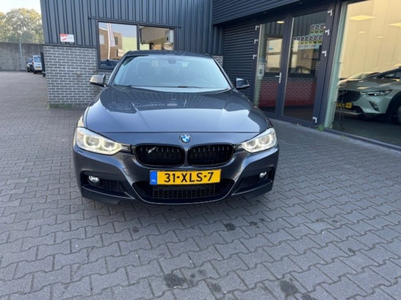 BMW 3-serie - 320I HIGH EXECUTIVE / PDC /  / Navi / AUT - AutoWereld.nl