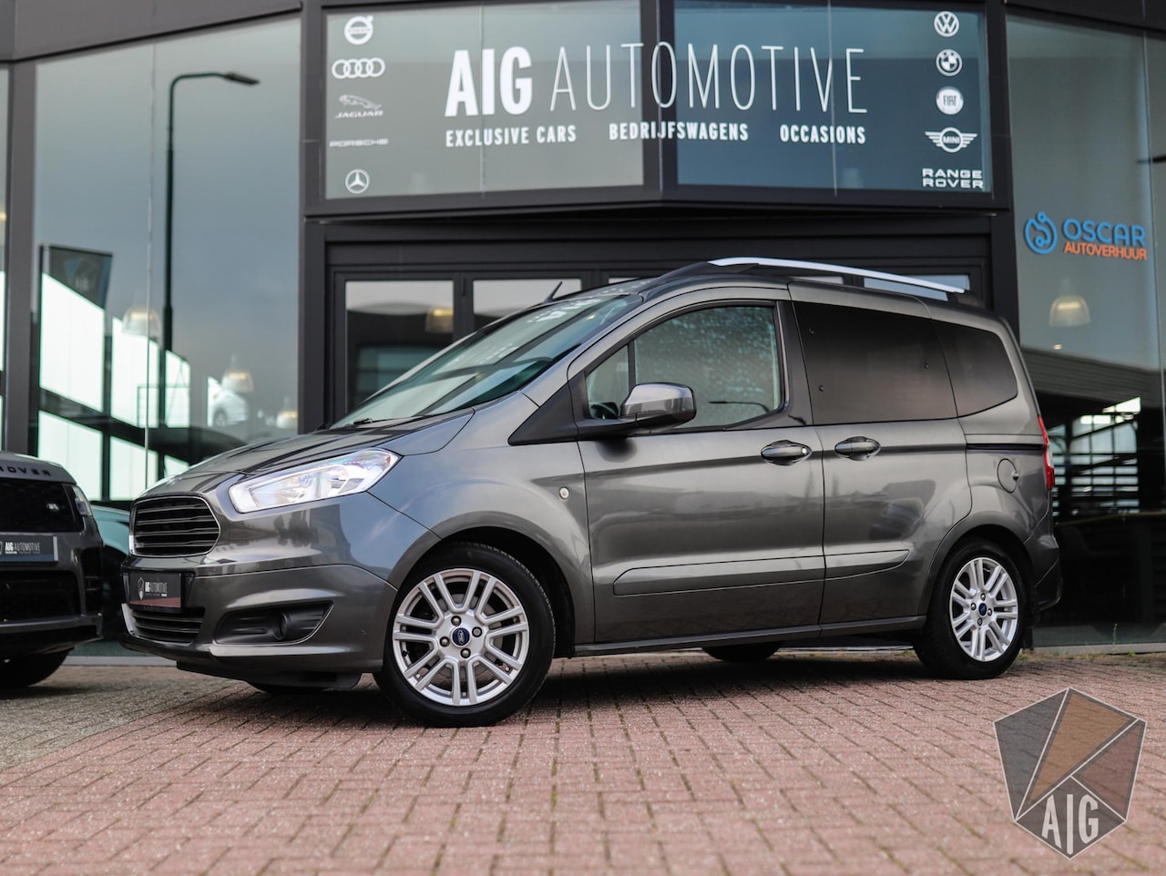 Ford Tourneo Courier - 1.0 Titanium | Stoelverw. | PDC | Navi | Cruise Control | Start-Stop | Bluetooth - AutoWereld.nl