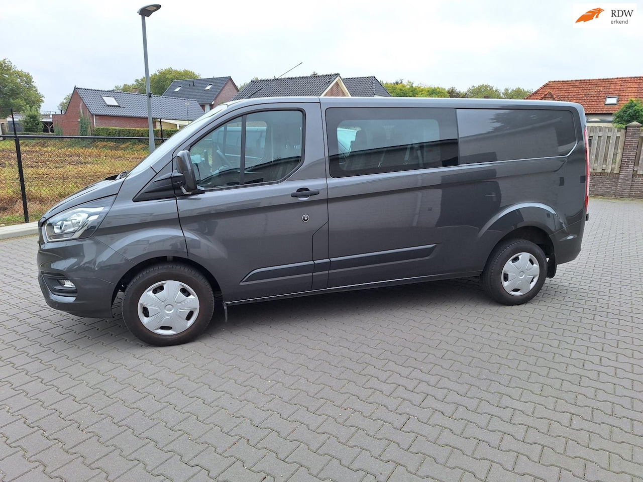 Ford Transit Custom - 320 2.0 TDCI L2H1 Limited DC 320 2.0 TDCI L2H1 Limited DC - AutoWereld.nl