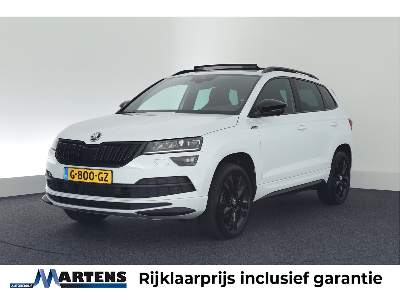 Skoda Karoq - 1.5 TSI 150pk DSG ACT Sportline Business Trekhaak Camera Panoramadak Canton Keyless Virtua - AutoWereld.nl