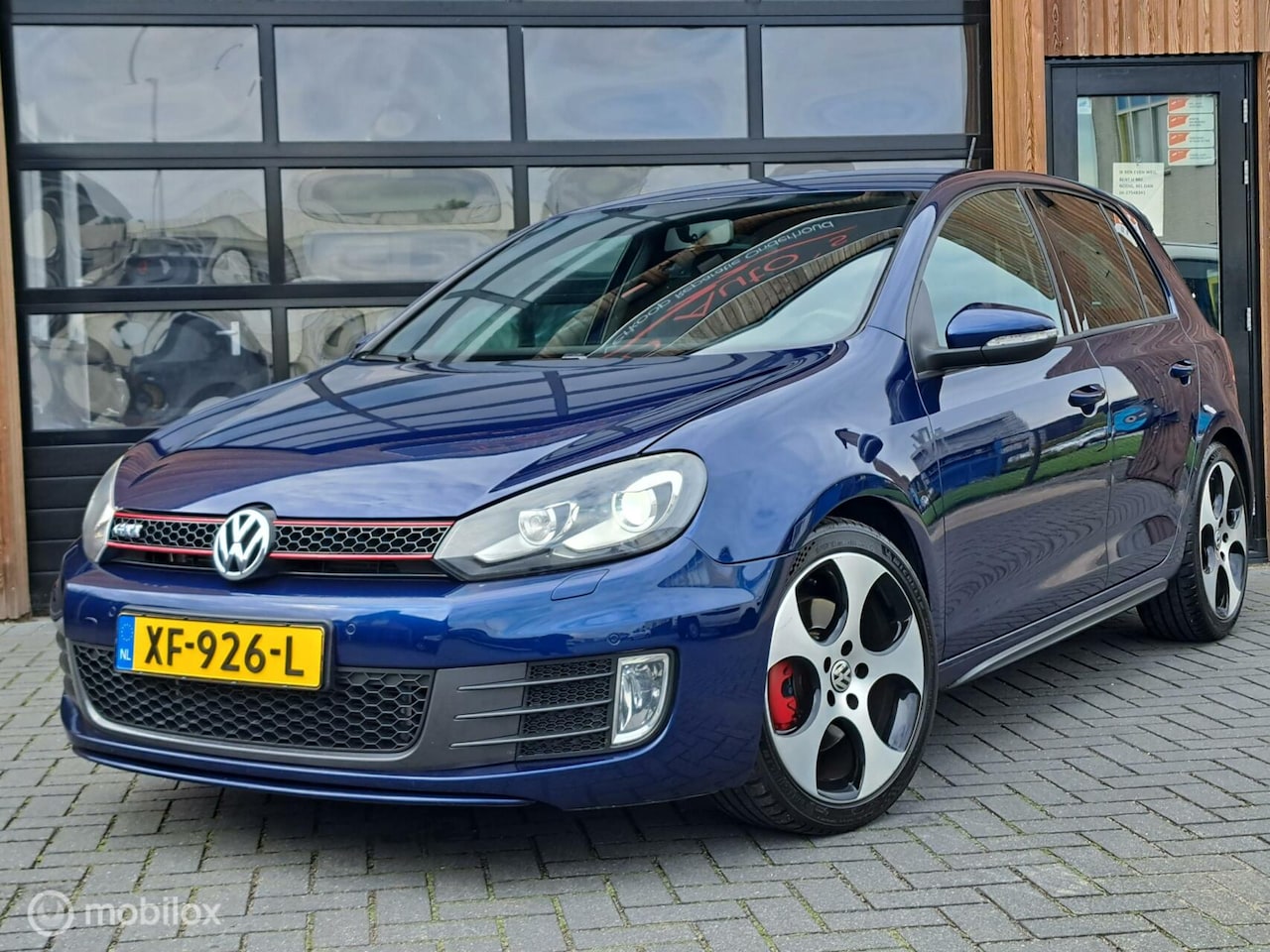 Volkswagen Golf - 2.0 GTI DSG 275PK XENON NAVI PDC CLIMA CRUISE - AutoWereld.nl