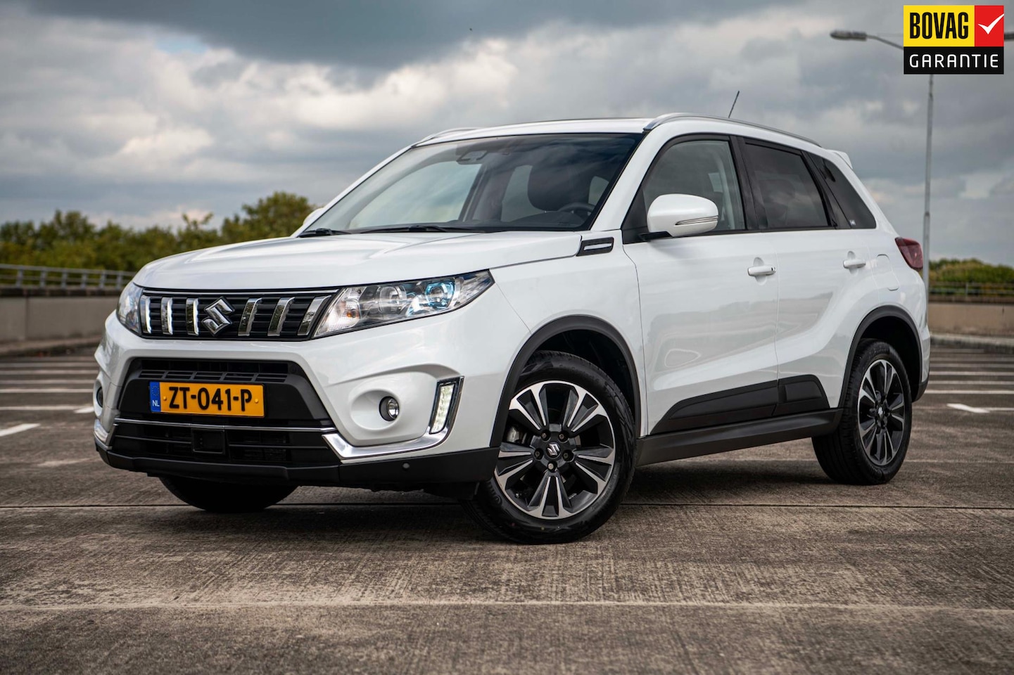 Suzuki Vitara - 1.4 140pk Boosterjet Stijl Automaat | Radar Cruise Control | Open dak | Navi | Hoge instap - AutoWereld.nl