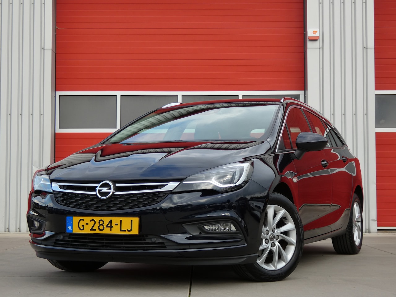 Opel Astra Sports Tourer - 1.0 Turbo Innovation/ lage km/ zeer mooi - AutoWereld.nl