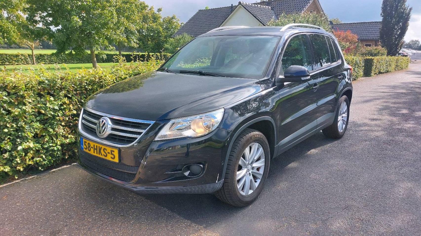 Volkswagen Tiguan - 1.4 TSI Sport&Style ECC/PANO BJ 2009 - AutoWereld.nl