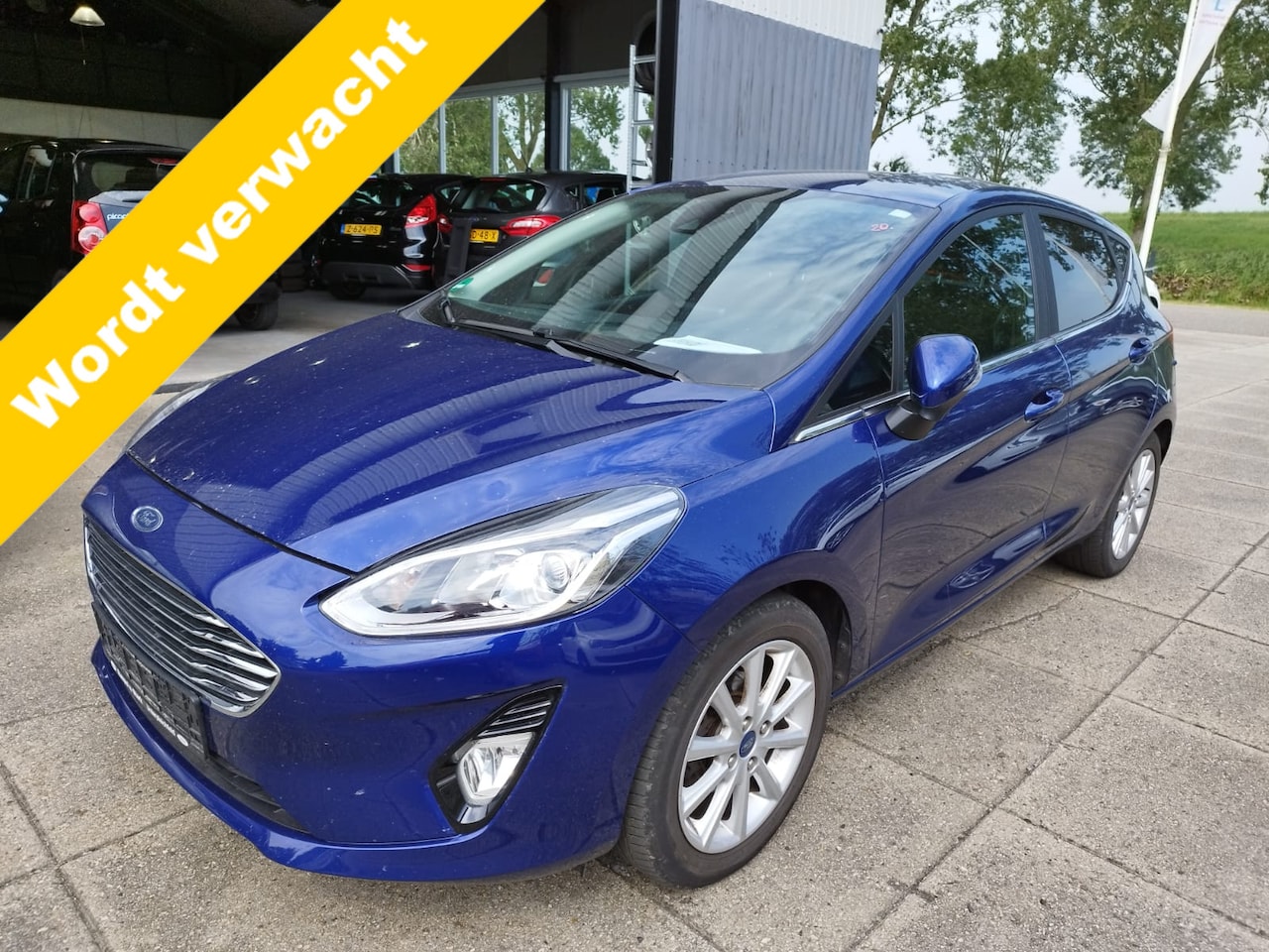 Ford Fiesta - 1.0 EcoBoost Titanium ** 125 PK ** NAVI ** PDC ** Bluetooth ** Stoelverwarming ** - AutoWereld.nl