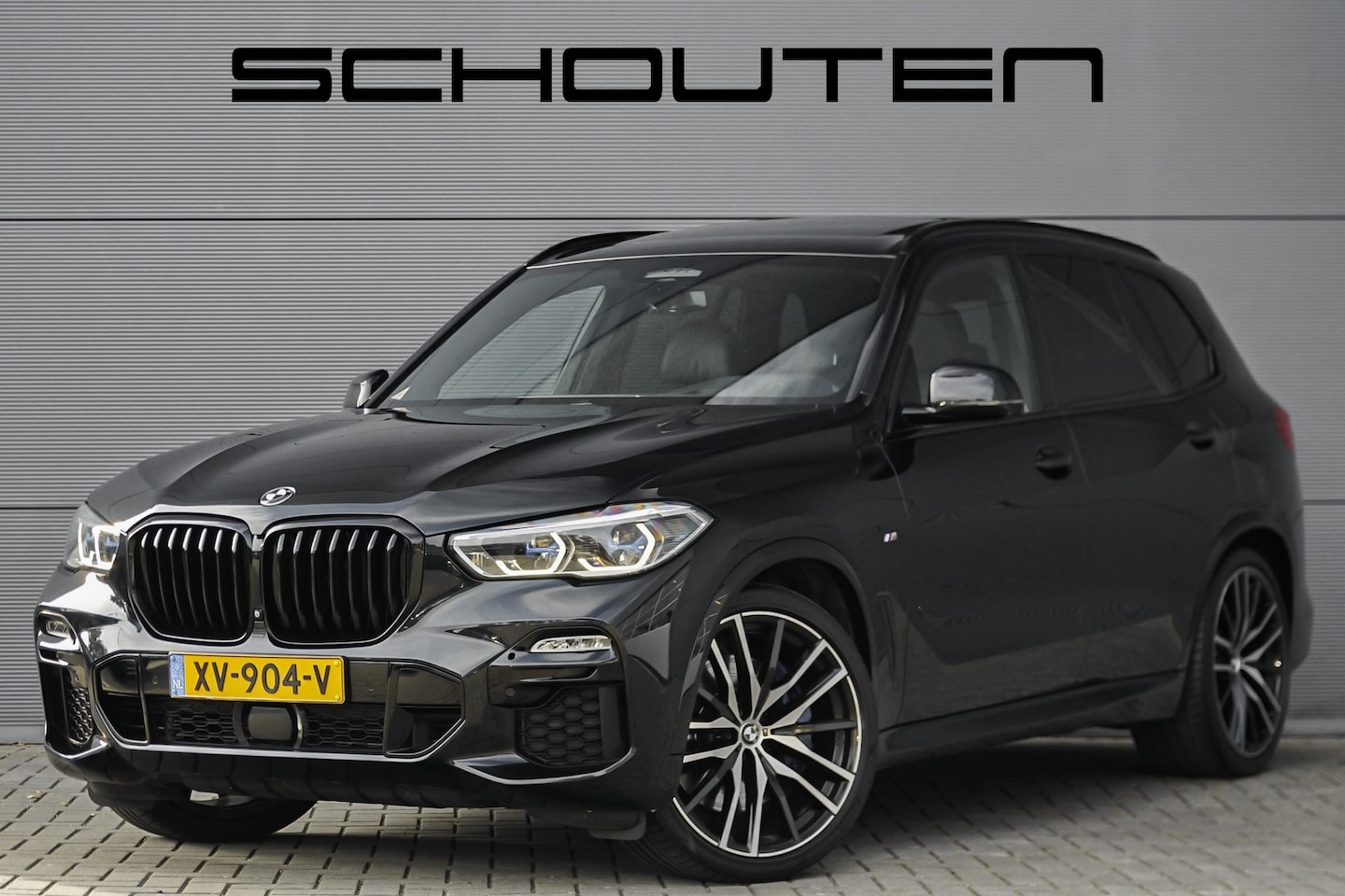 BMW X5 - xDrive40i M-Sport Pano HUD Luchtvering H/K 360° Camera - AutoWereld.nl