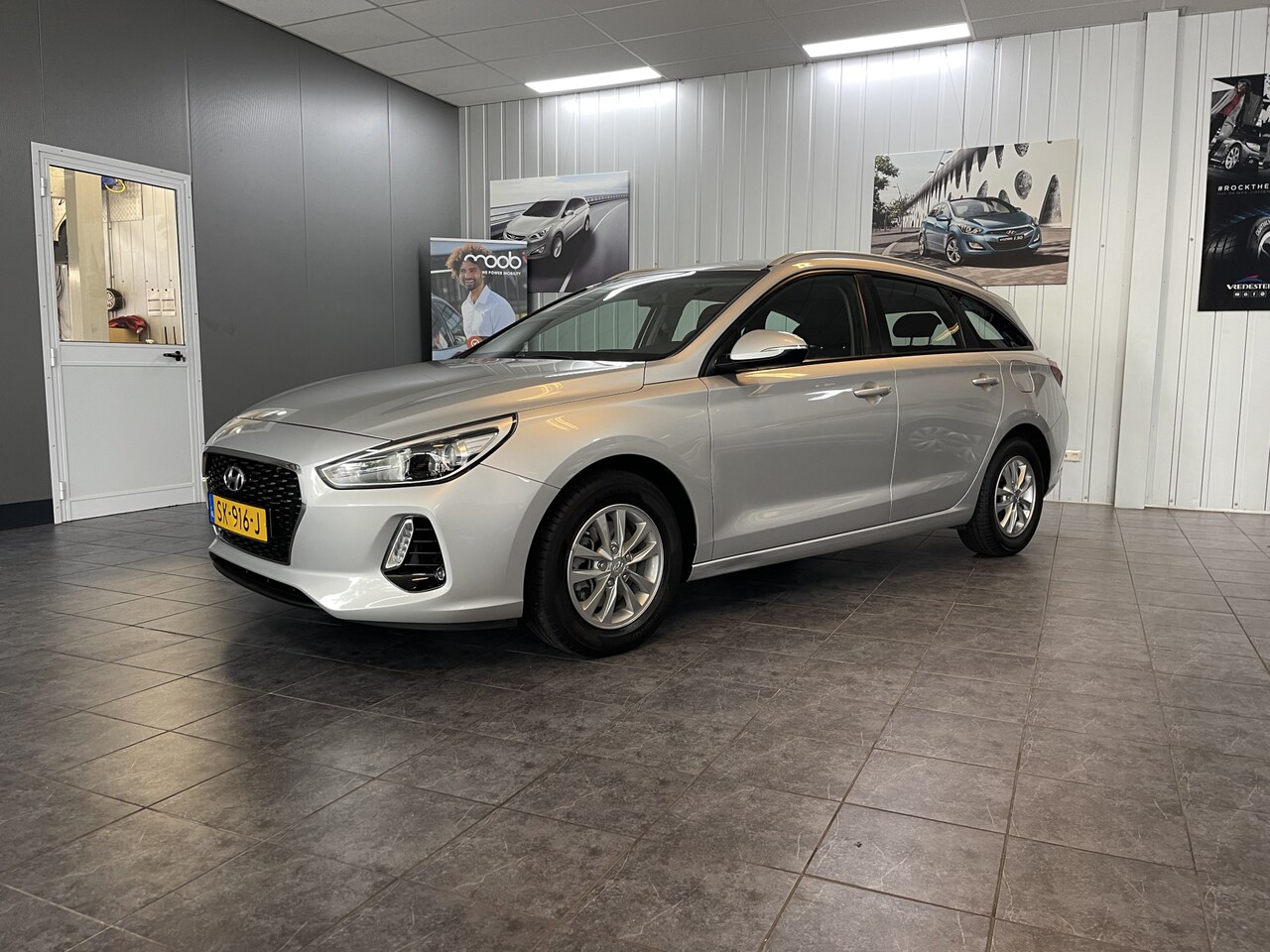 Hyundai i30 Wagon - 1.4 T-GDI Comfort Navigatie, Climate control. Trekhaak. - AutoWereld.nl