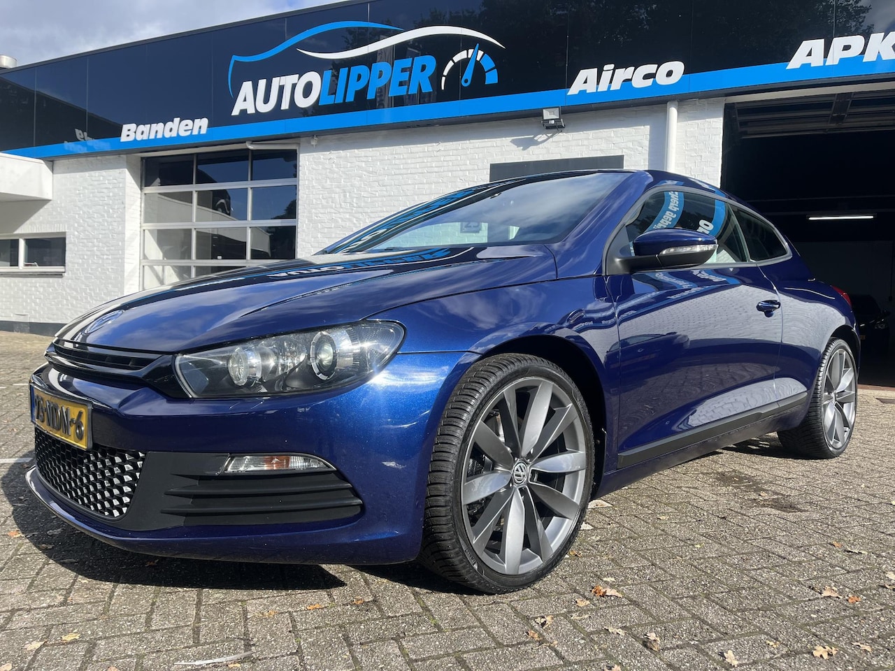 Volkswagen Scirocco - 1.4 TSI Highline /DSG automaat/Leder/Lm velgen all season banden. - AutoWereld.nl