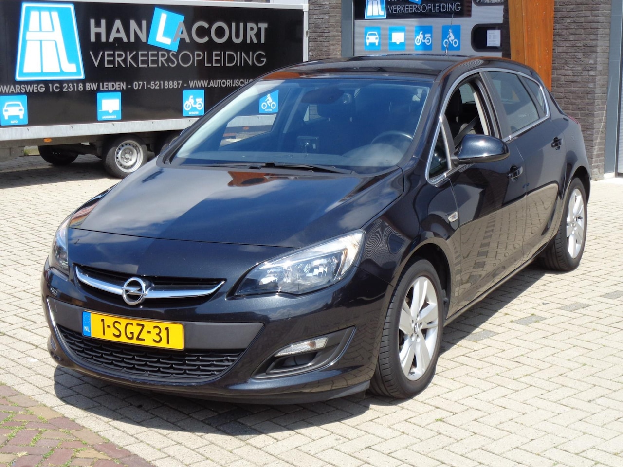 Opel Astra - 1.4 Turbo Rhythm Airco Cruise LMV Trekhaak 5-Drs - AutoWereld.nl