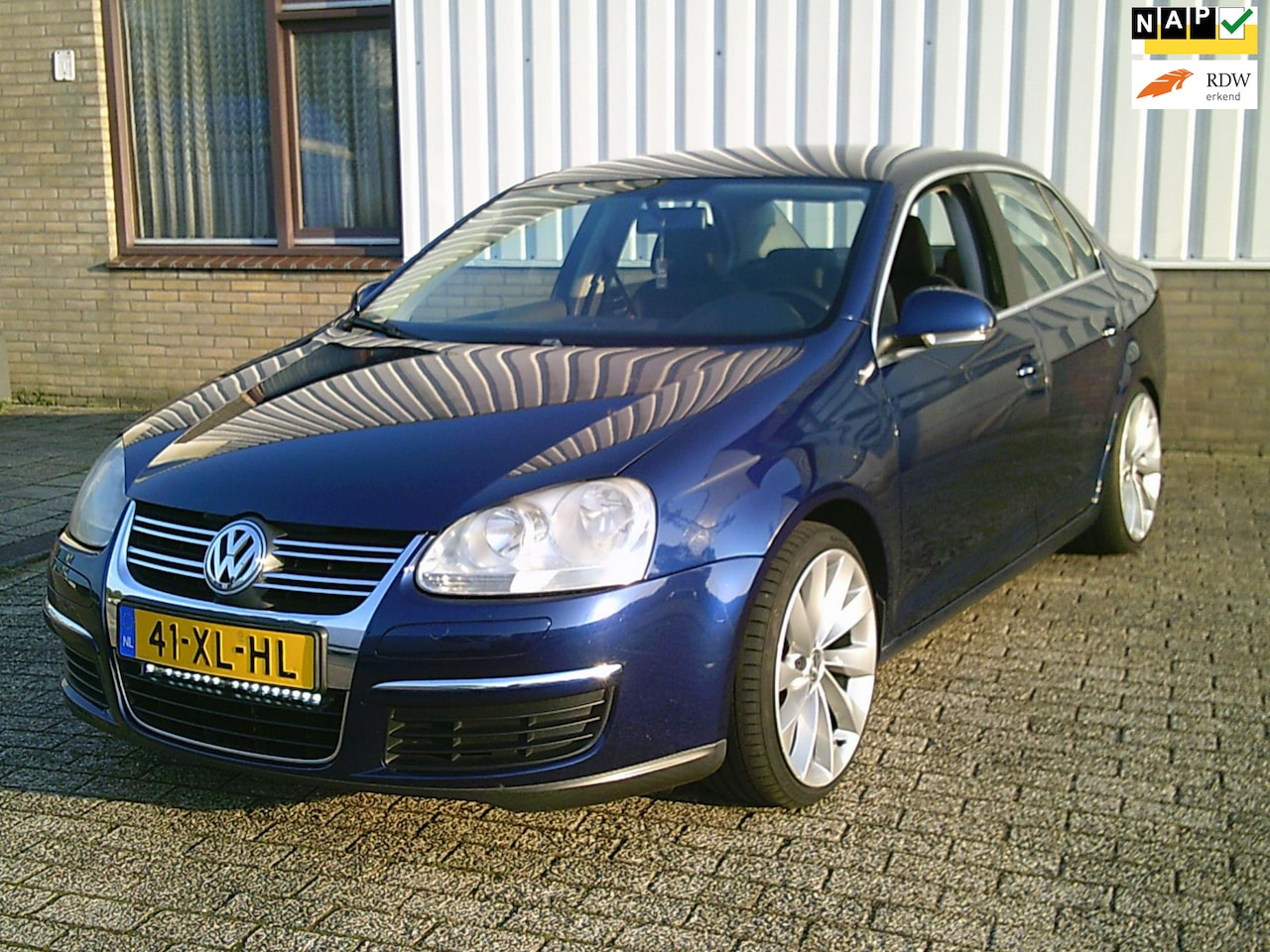 Volkswagen Jetta - 1.6 Comfortline Nwe Distr. Riem Airco Navi LMV Cruise - AutoWereld.nl