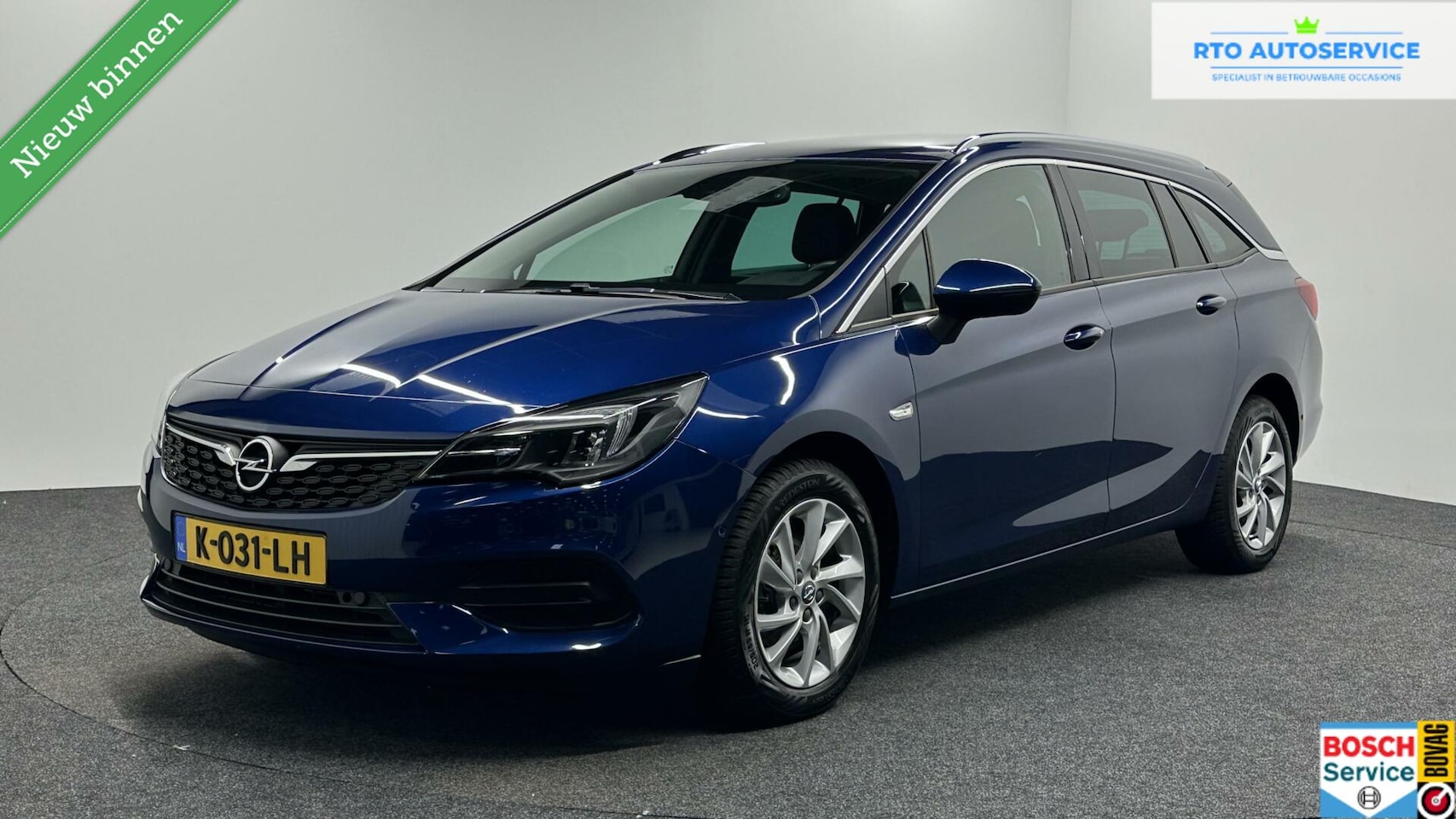 Opel Astra Sports Tourer - 1.2 Blitz Elegance 1.2 Blitz Elegance 145 PK - AutoWereld.nl