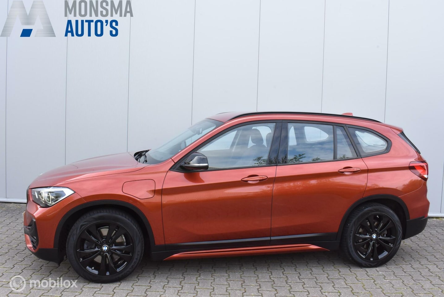 BMW X1 - xDrive25e High Exe 2021 Sunset Orange | Black Optic | Leder Sportstoelen LED Keyless 18" T - AutoWereld.nl