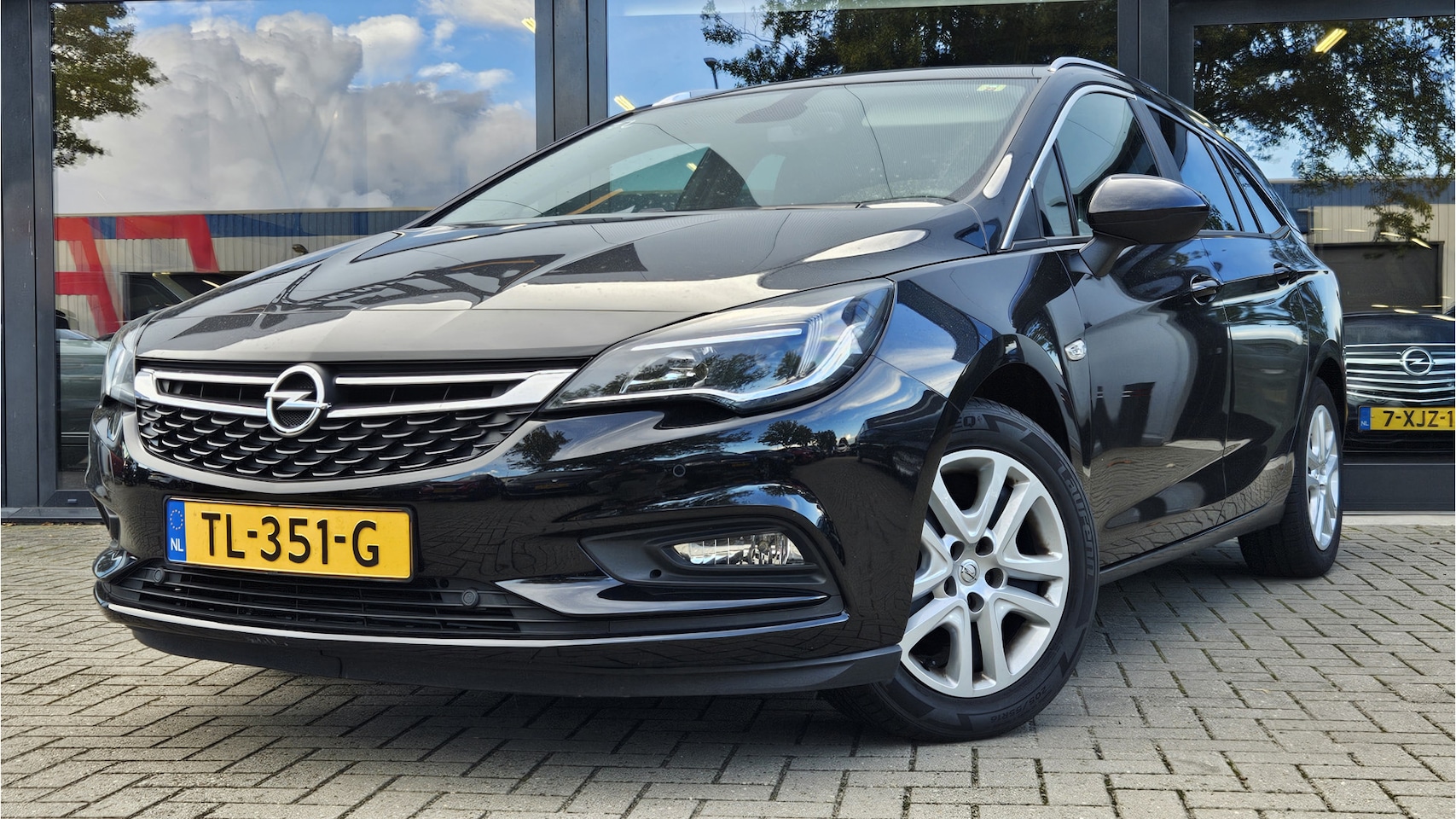 Opel Astra Sports Tourer - 1.0 Online Edition + NAVIGATIE + KLIMA + CRUISE + LEDER PAKKET - AutoWereld.nl