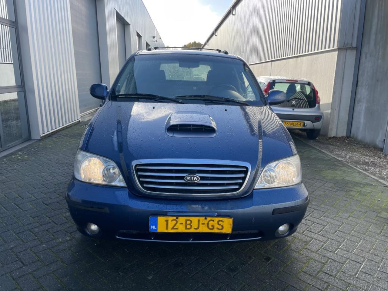 Kia Carnival - 2.9 automaat youngtimer bestelauto marge - AutoWereld.nl