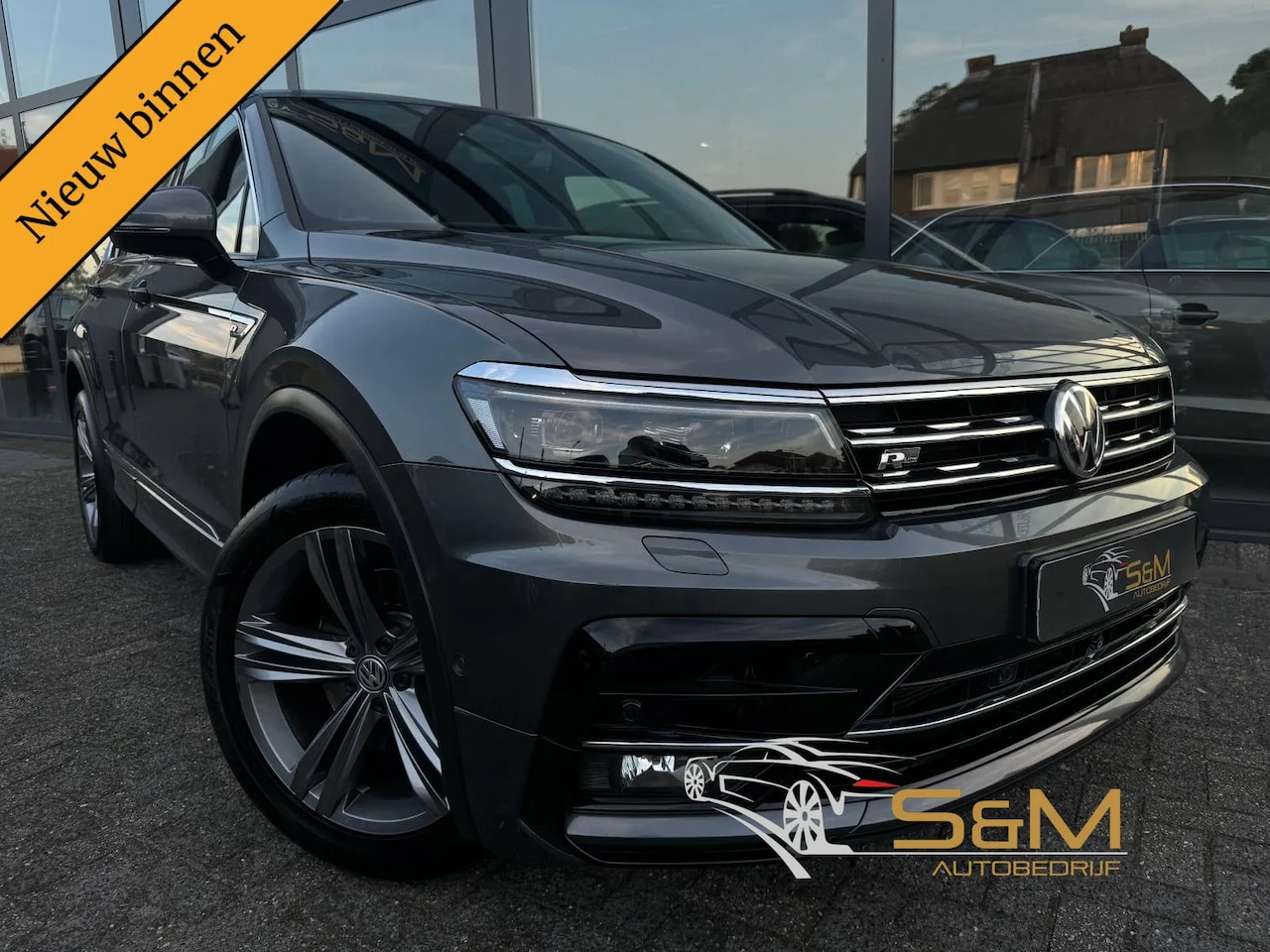 Volkswagen Tiguan - 2.0 TSI 4Motion Highline 2.0 TSI 4Motion Highline - AutoWereld.nl