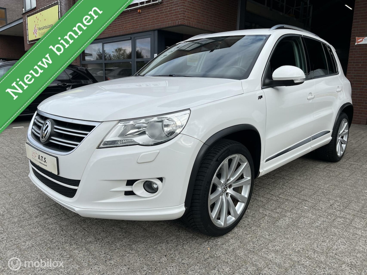 Volkswagen Tiguan - 1.4 TSI R-LINE NAVI*CAMERA*TREKHAAK*CLIMA - AutoWereld.nl