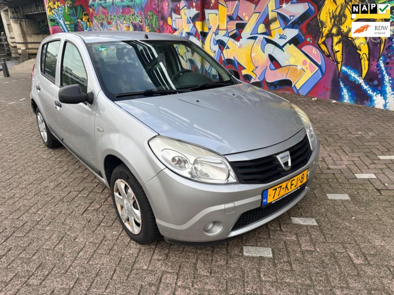 Dacia Sandero - 1.2 Ambiance airco elektrische ramen cv boeken aanwezig leuke auto zuinige 1.2 motor - AutoWereld.nl