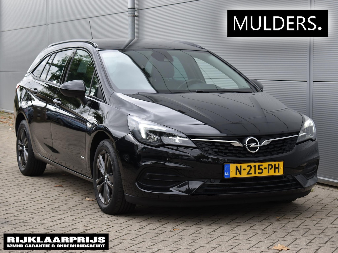 Opel Astra Sports Tourer - 1.2 turbo 130 pk Business Edition / navi / camera - AutoWereld.nl