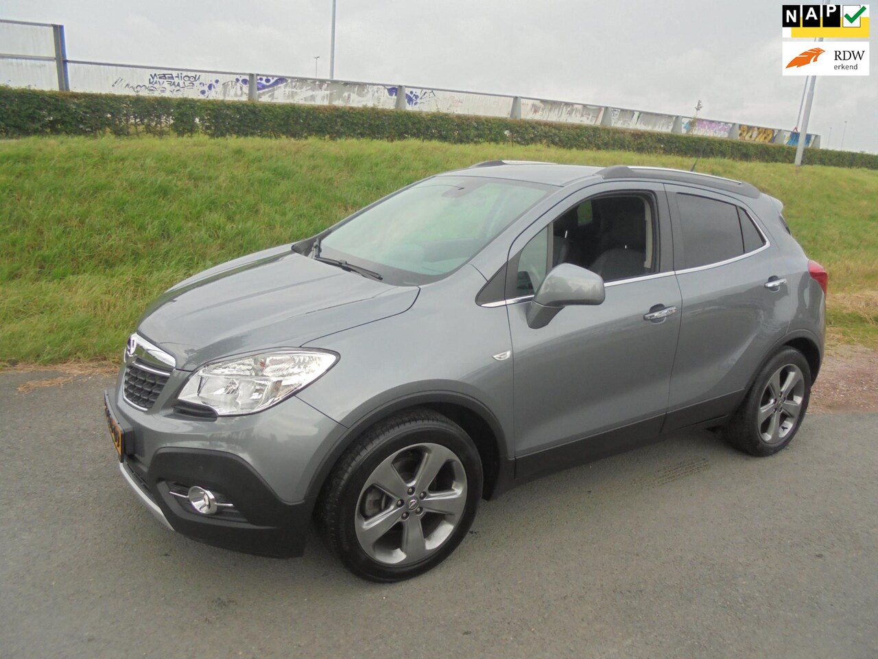 Opel Mokka - Opel Mokka 1.4 turbo Cosmo airco trekhaak lmv navigatie pdc leer - AutoWereld.nl