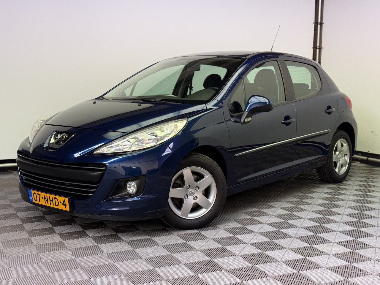 Peugeot 207 - 1.4 VTi Style 5-drs Airco LM15" NL Auto - AutoWereld.nl