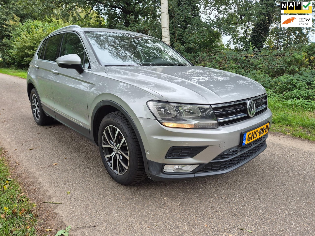 Volkswagen Tiguan - 1.4 TSI ACT Highline / PANORAMADAK / LEER / EL. STOEL - AutoWereld.nl