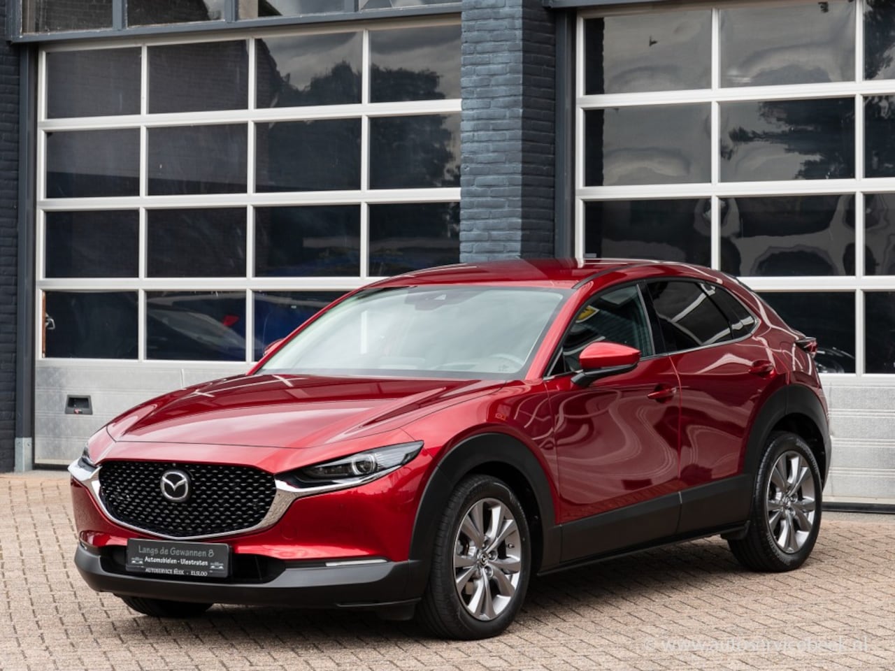 Mazda CX-30 - 2.0 e-Skyactiv M-Hybrid luxury, lederen bekleding, navi - AutoWereld.nl