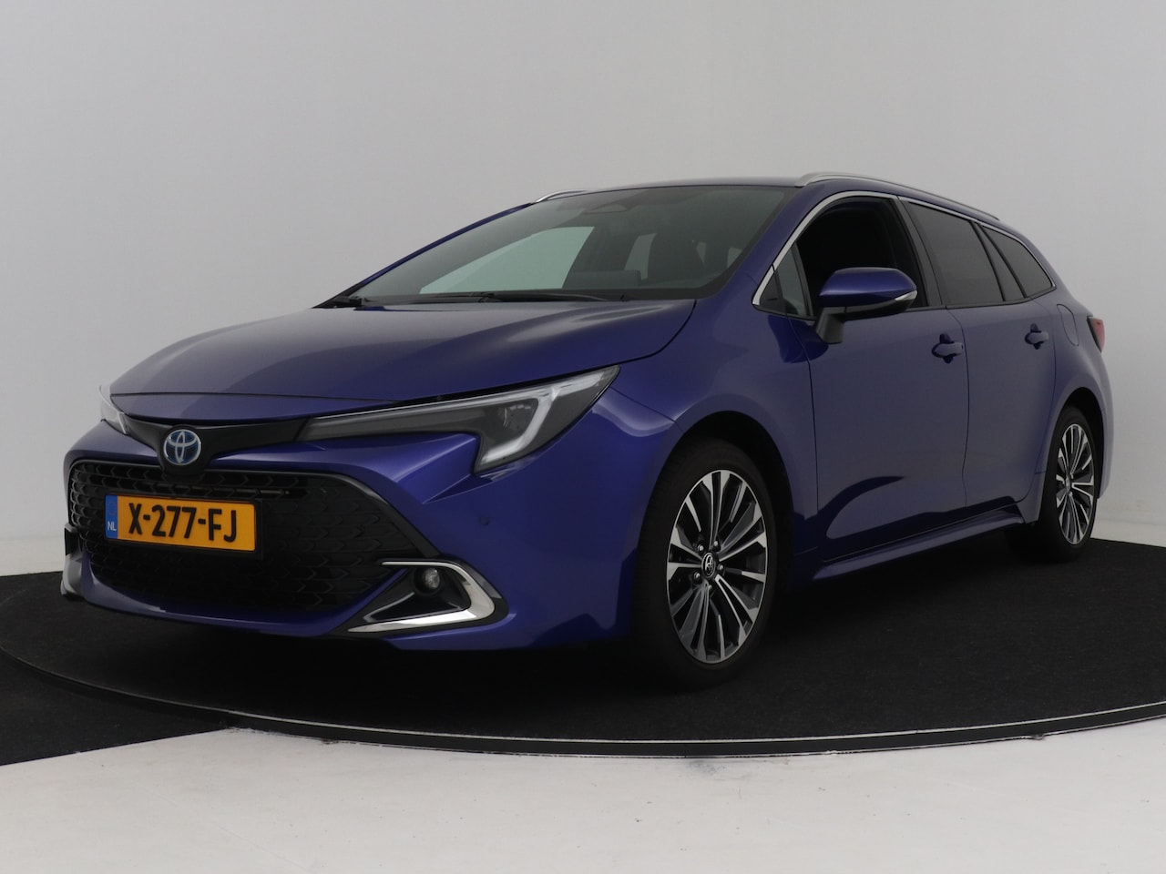 Toyota Corolla Touring Sports - 1.8 Hybrid First Edition | Apple Carplay | Android Auto | Parkeersensoren | Half leder | - AutoWereld.nl