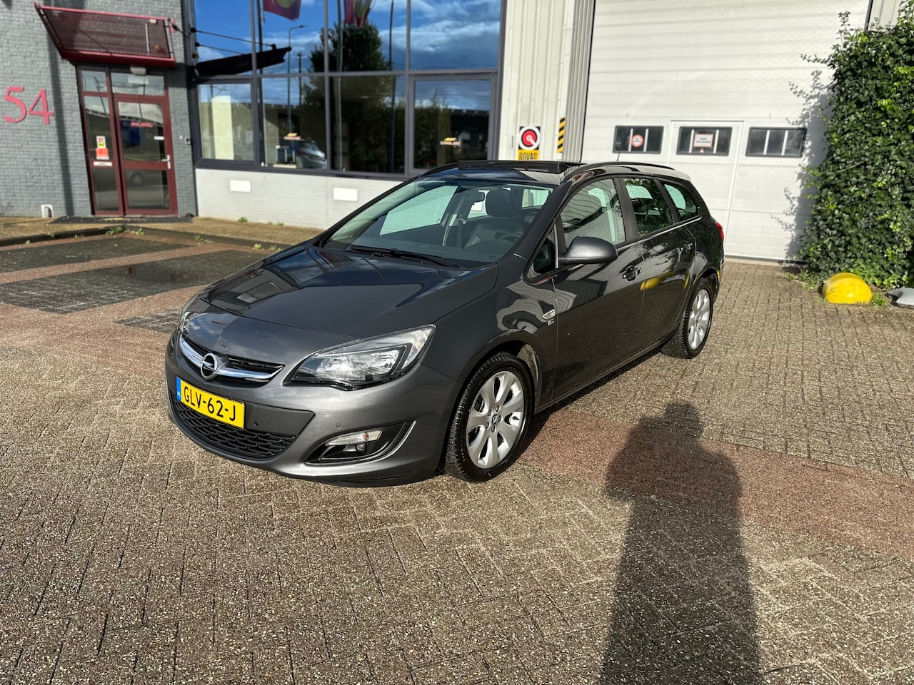 Opel Astra Sports Tourer - 1.6 Sport 1.6 Sport, AUTOMAAT,PANO,Cruis,Clima, Inruil mog. - AutoWereld.nl