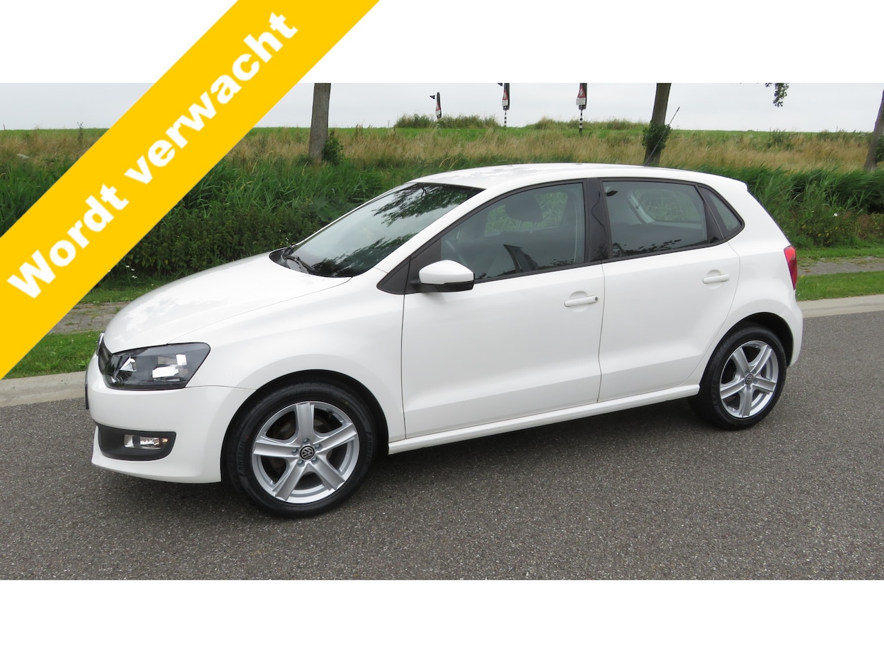 Volkswagen Polo - 1.2-12V ** 5 DRS ** 126.747 km ** Airco ** ** Lm velgen ** NAVI ** - AutoWereld.nl