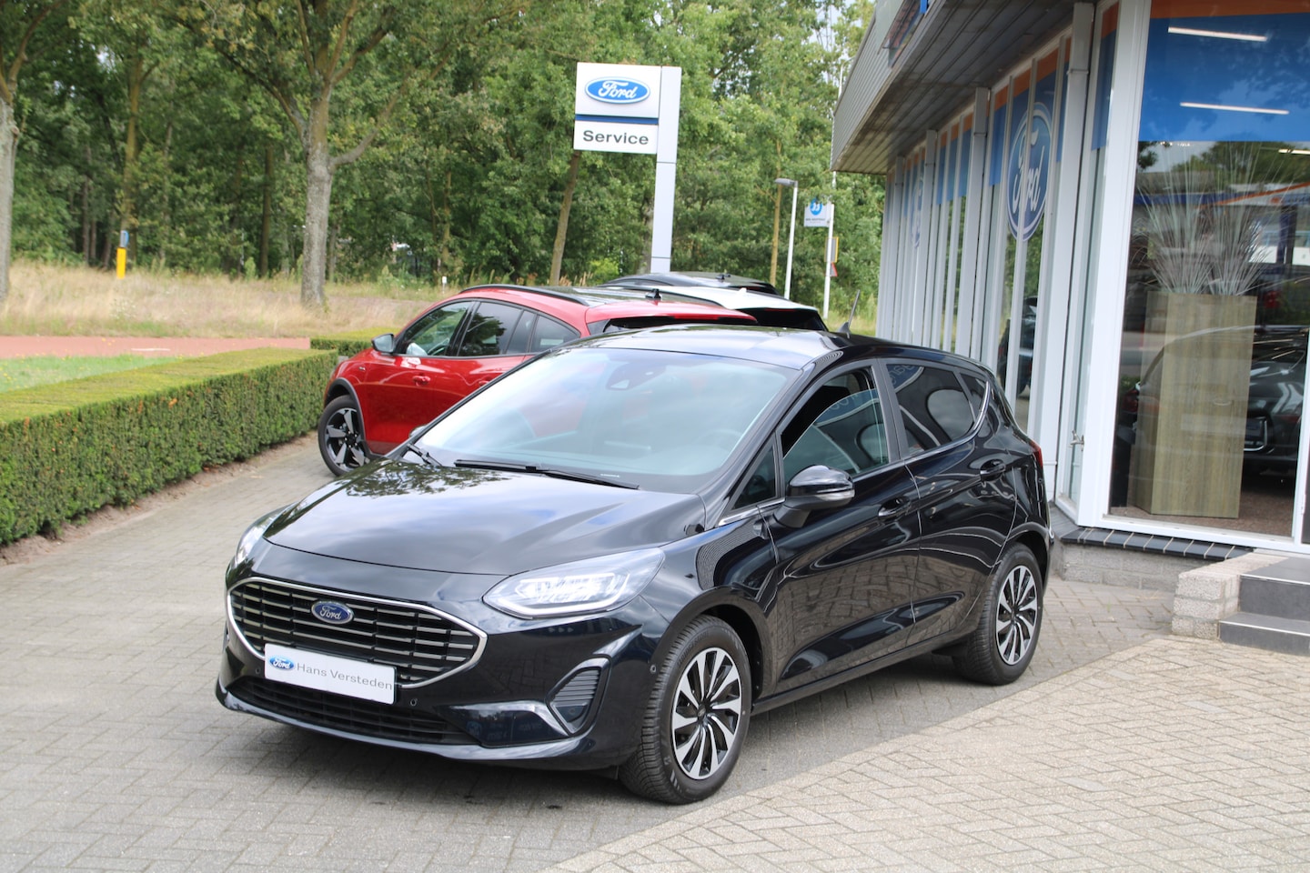 Ford Fiesta - 1.0 EcoBoost 125pk Hybrid Titanium Automaat WINTERPACK PDC CAMERA KEYLES - AutoWereld.nl