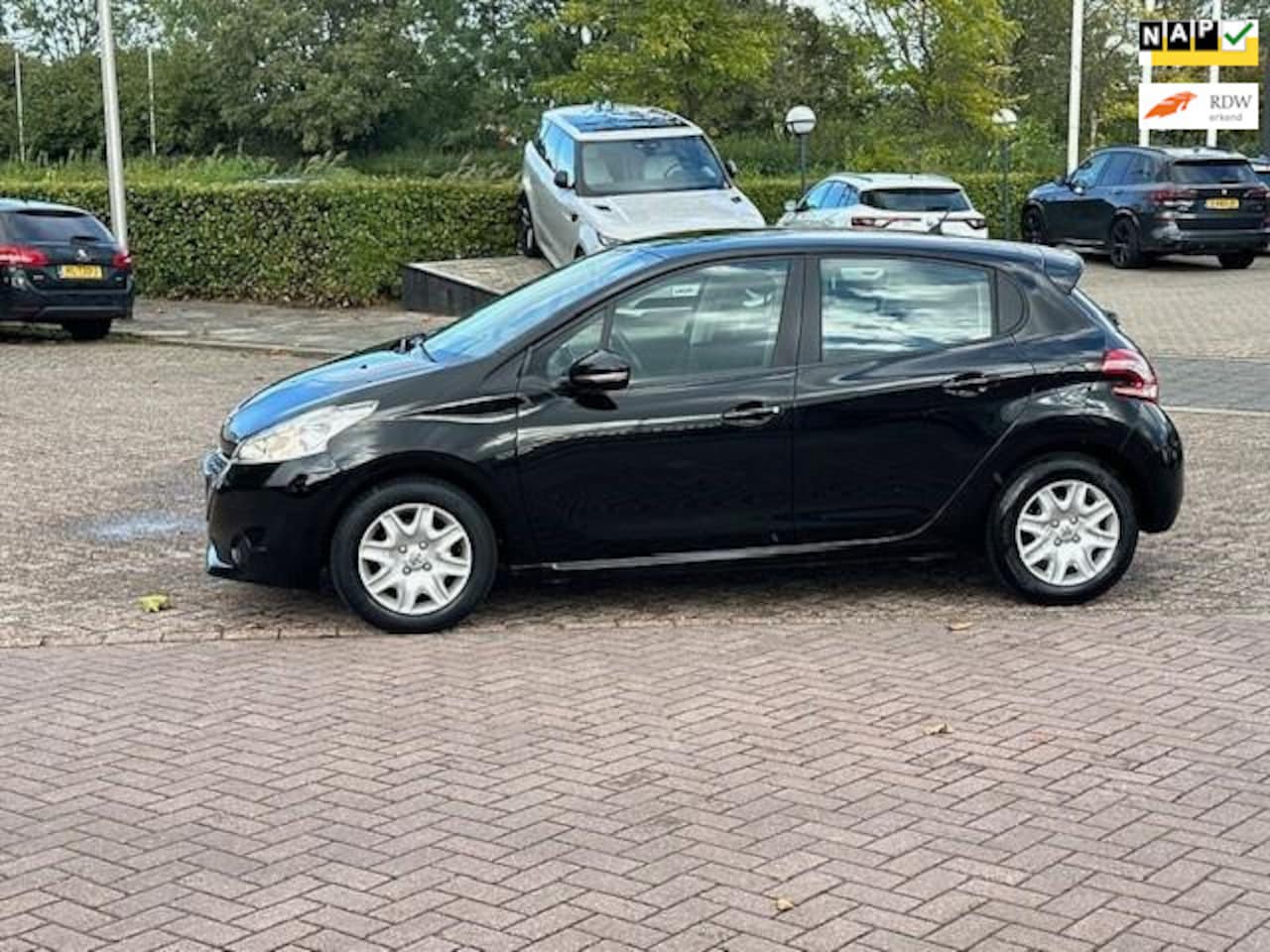 Peugeot 208 - 1.2 Vti Active 1.2 VTi Active,bj.2012,kleur:zwart,airco,5 deurs,sportvelgen,APK 09/2025 en NAP met 223984 - AutoWereld.nl