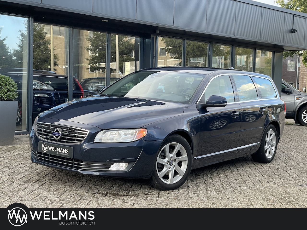 Volvo V70 - 1.6 D2 Nordic+ automaat | Leder | Navi | Trekhaak - AutoWereld.nl