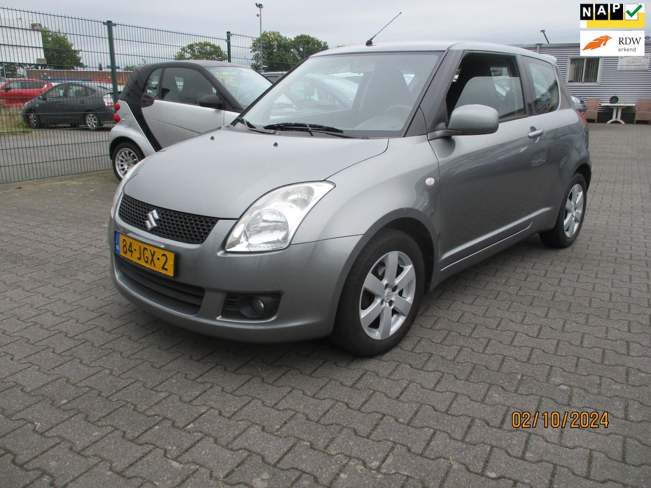 Suzuki Swift - Suzuki Swift 1.3 Bandit-AIRCO-KLIMAAT CONTROL - AutoWereld.nl