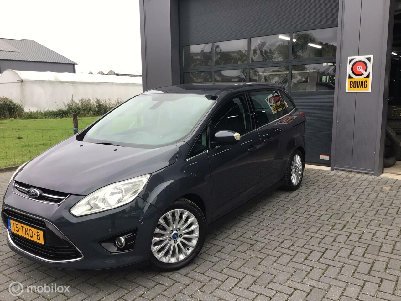 Ford Grand C-Max - 1.6 EcoB L. Titanium/Vol opties/perf.onderh - AutoWereld.nl