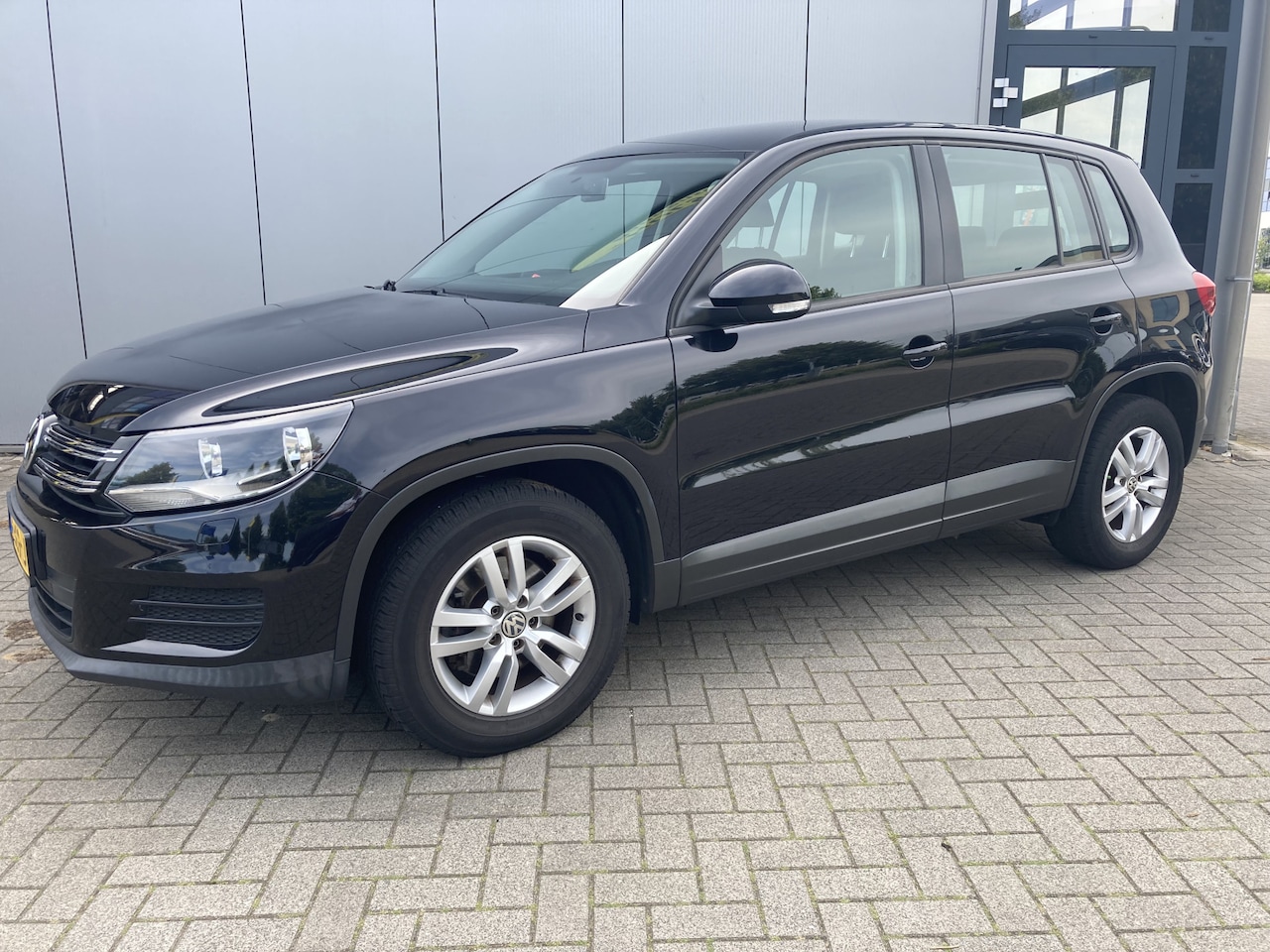 Volkswagen Tiguan - 1.4 TSI Sport&Style Navi | Clima | Cruise control - AutoWereld.nl