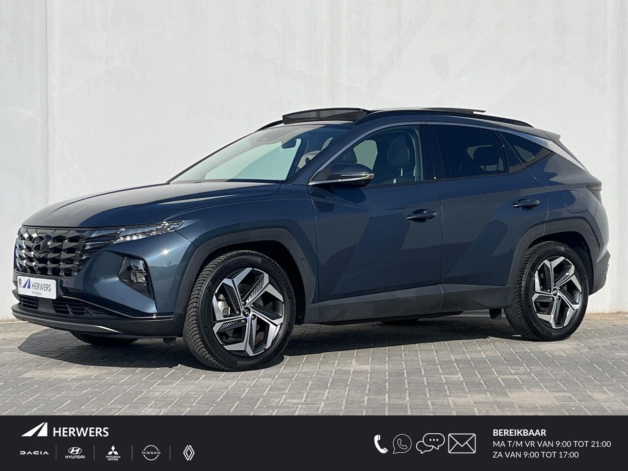 Hyundai Tucson - 1.6 T-GDI HEV 230PK Automaat Premium Sky / 1650kg Trekgewicht / Schuif-/kanteldak / Ledere - AutoWereld.nl