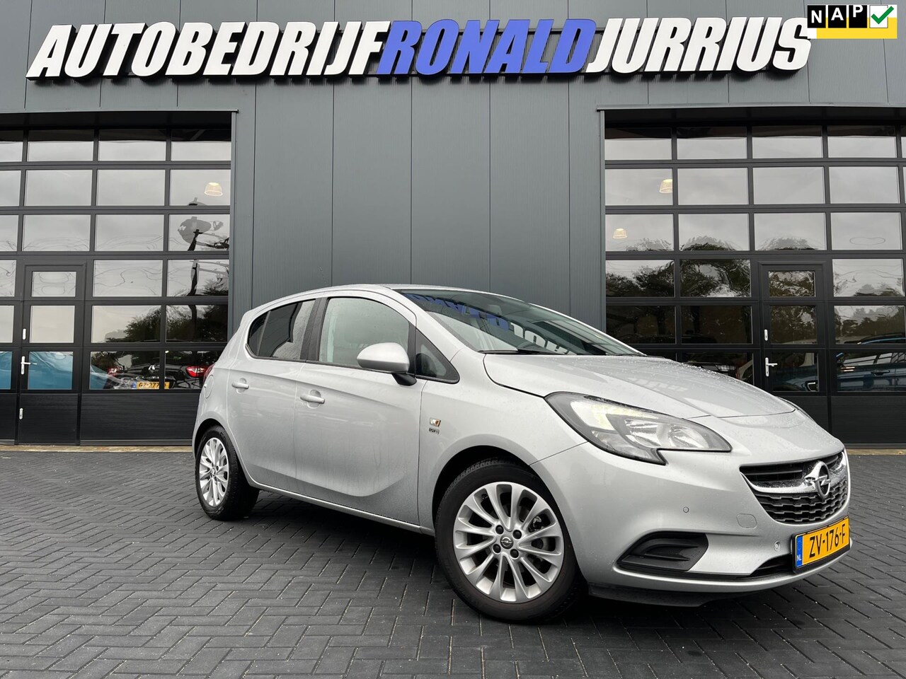 Opel Corsa - 1.4 120 Jaar Edition 90PK/Camera/Navigatie/Climatronic/Stoelverwarming/5Deurs/1Ste Eigenaa - AutoWereld.nl