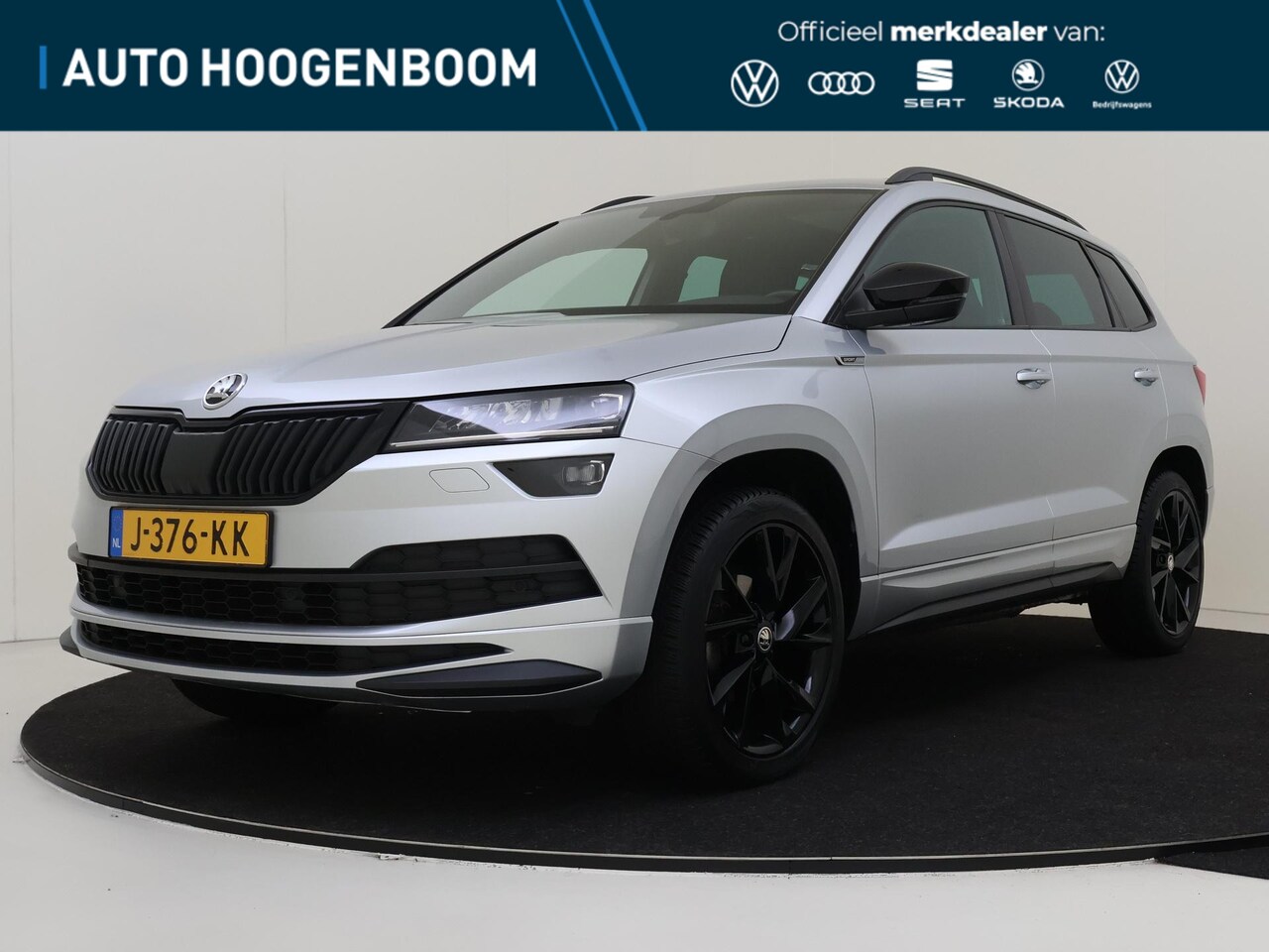 Skoda Karoq - 1.5 TSI ACT Sportline Business | Panoramadak | CANTON Audio | Achteruitrijcamera | Vol led - AutoWereld.nl