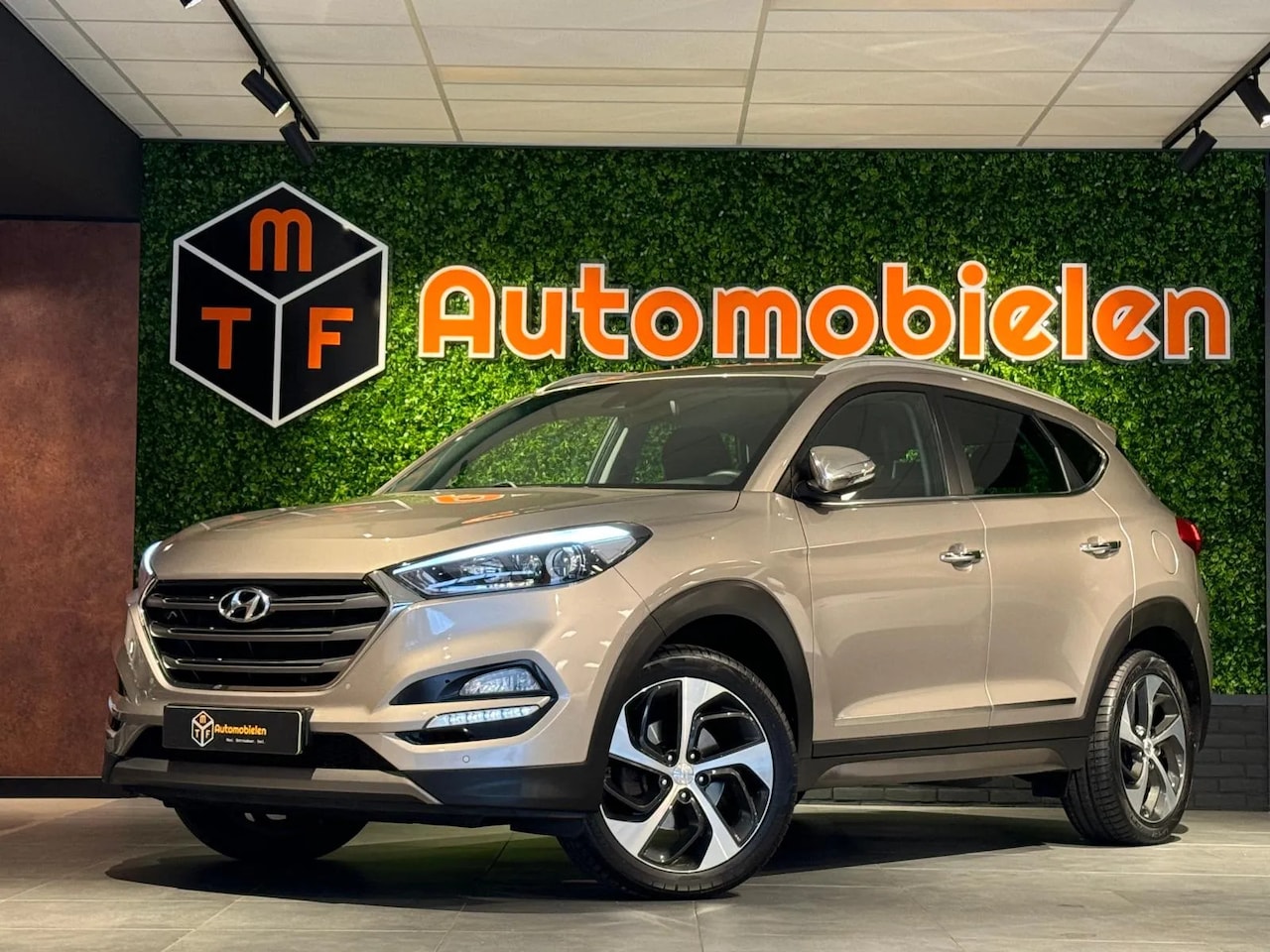 Hyundai Tucson - 1.6 GDI Comfort 1.6 GDi Comfort - AutoWereld.nl