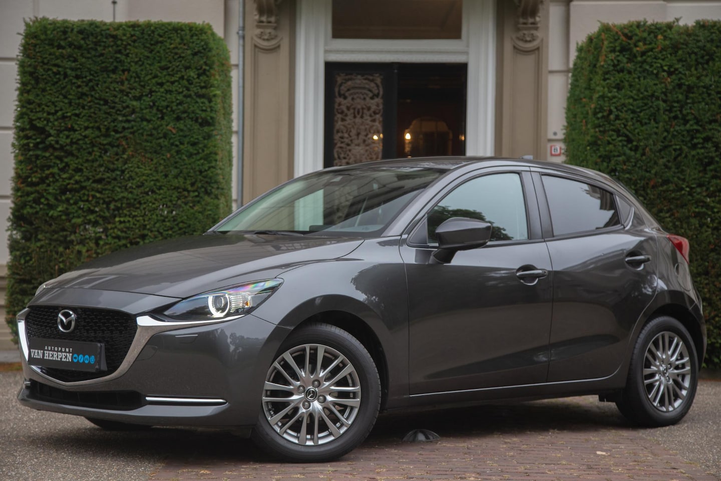 Mazda 2 - 1.5 Skyactiv-G Okinami Stoel- en stuurverw | Half leder | Dodehoeksens - AutoWereld.nl