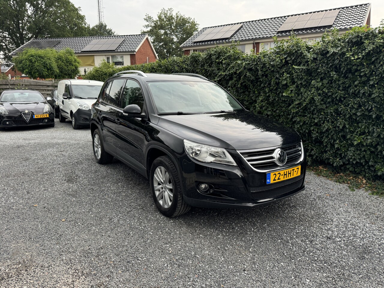 Volkswagen Tiguan - 1.4 TSI Sport&Style | Leer | Navi | Autom. Airco | Cruise Control | Park Assist | PDC | LM - AutoWereld.nl