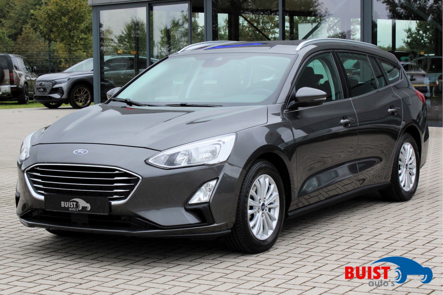 Ford Focus Wagon - 1.0 EcoBoost 125pk Titanium Business NAVI CLIMA CRUISE PDC - AutoWereld.nl