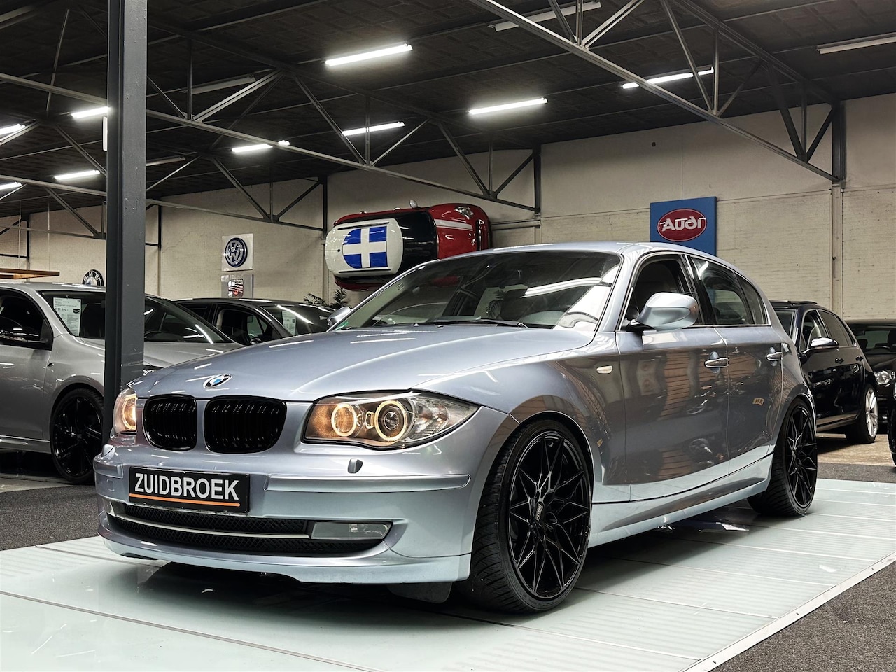 BMW 1-serie - 130i 6-CIL AUT 5-Deurs LCI Xenon Bilstein Navi M-Sport - AutoWereld.nl