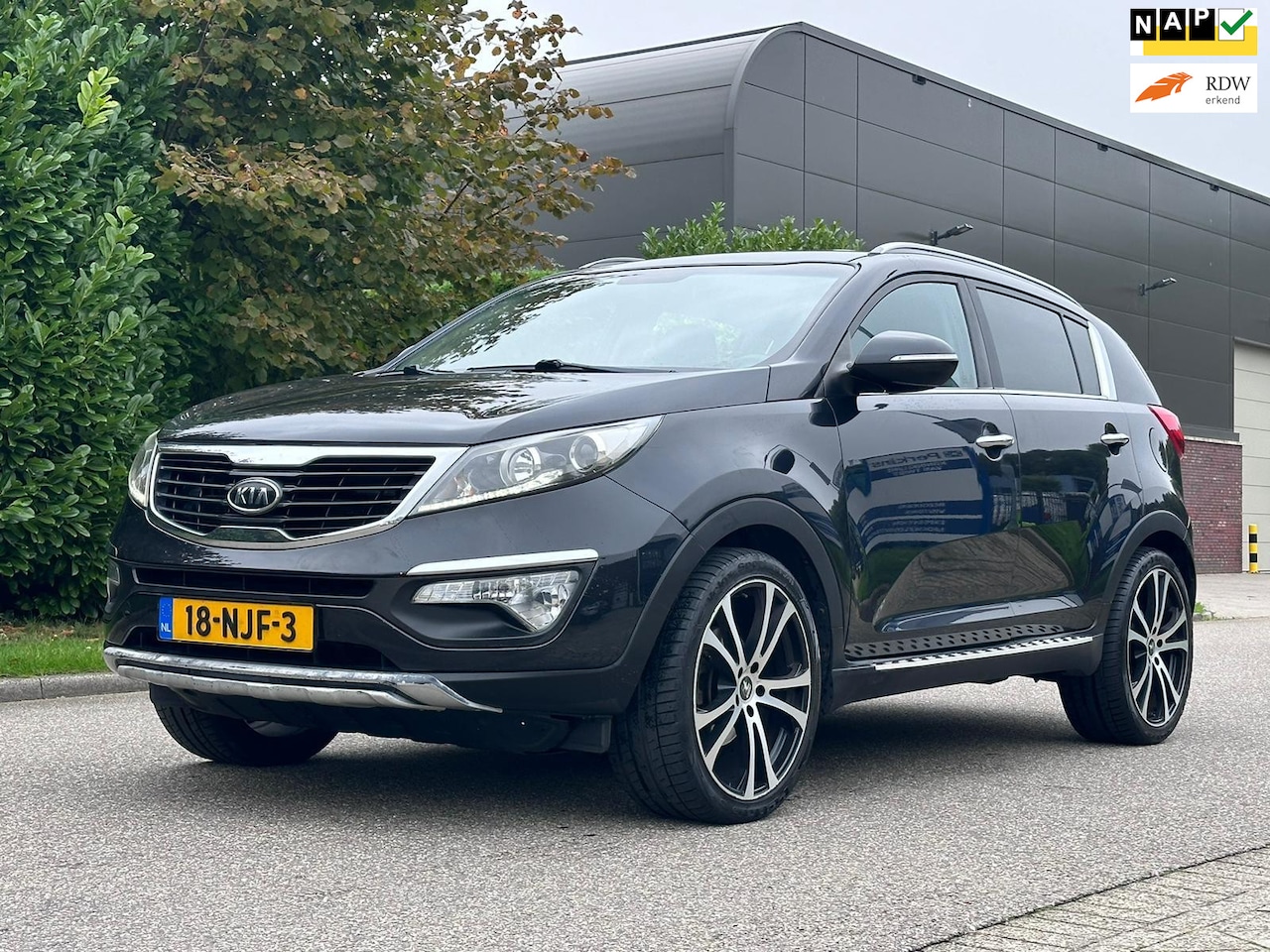 Kia Sportage - 2.0 X-ecutive Plus Pack Automaat*Navigatie*Half Leder*Cruise*Clima*LM velgen*NAP*Trekhaak* - AutoWereld.nl