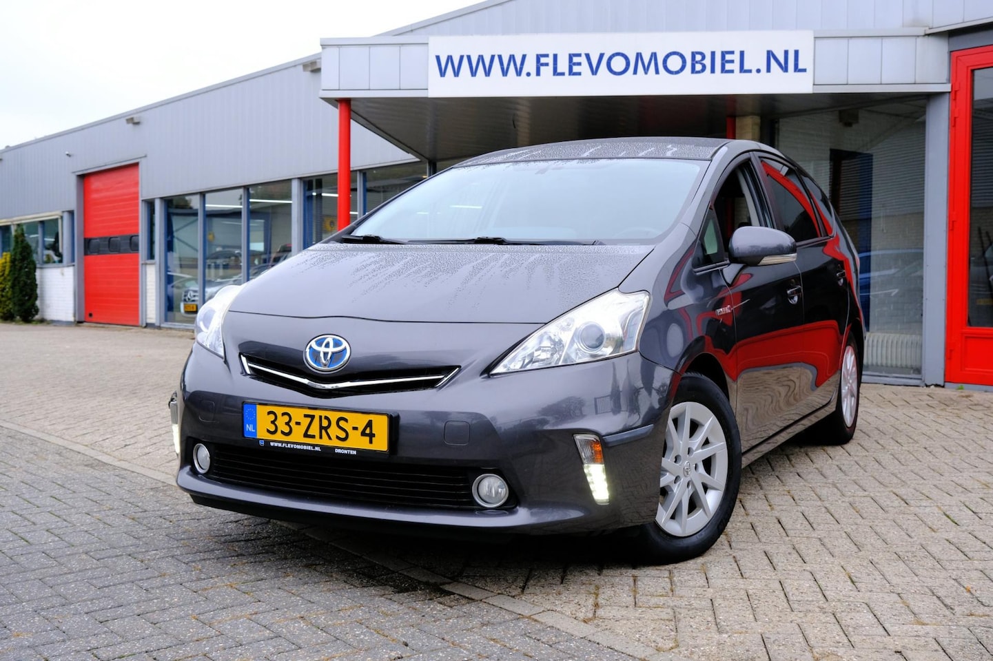 Toyota Prius Wagon - 1.8 Aspiration 7-pers Aut. Pano|1e Eig|Navi|Cam|Clima - AutoWereld.nl