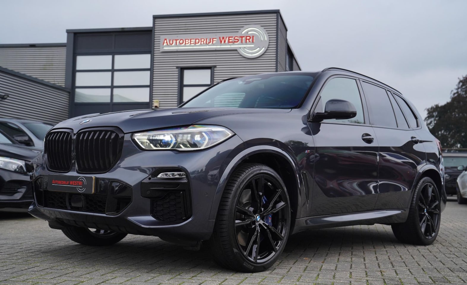 BMW X5 - M50d Executive | Skylounge | Massage | Elek trekhaak | Panorama | Harman/Kardon | Carbon i - AutoWereld.nl